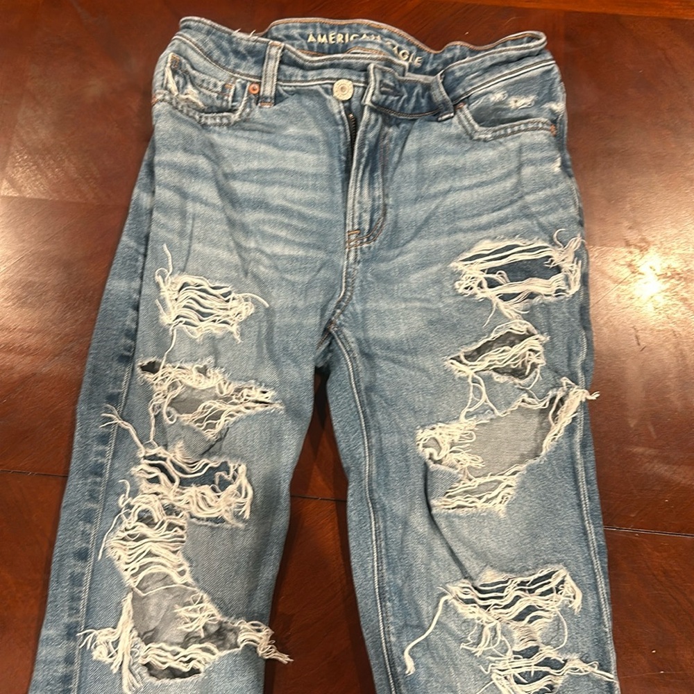 American Eagle ripped mom jeans high rise cross hem